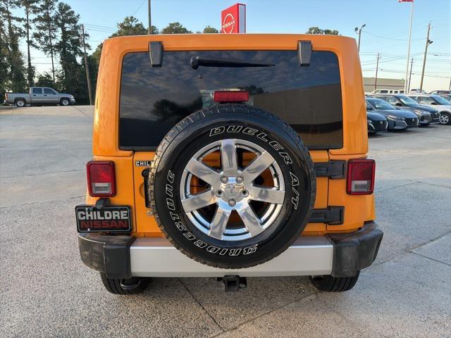 used 2013 Jeep Wrangler Unlimited car, priced at $12,999