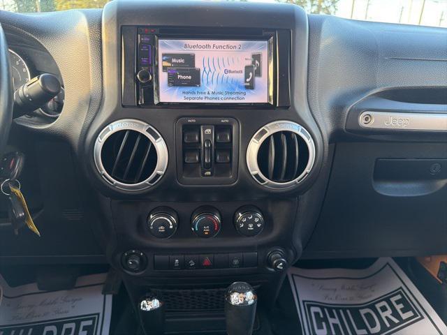 used 2013 Jeep Wrangler Unlimited car, priced at $12,999