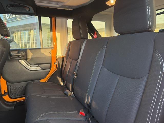 used 2013 Jeep Wrangler Unlimited car, priced at $12,999