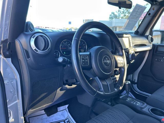 used 2012 Jeep Wrangler Unlimited car, priced at $19,404