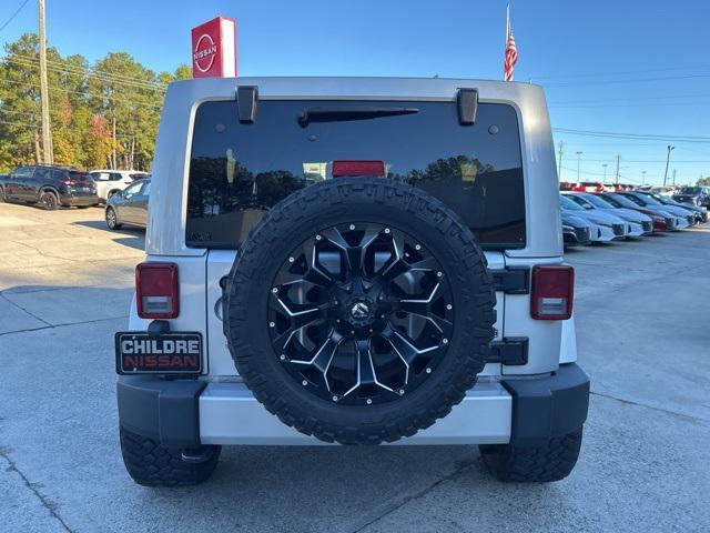 used 2012 Jeep Wrangler Unlimited car, priced at $19,404