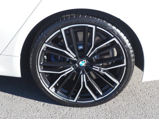 used 2023 BMW M550 car, priced at $61,446