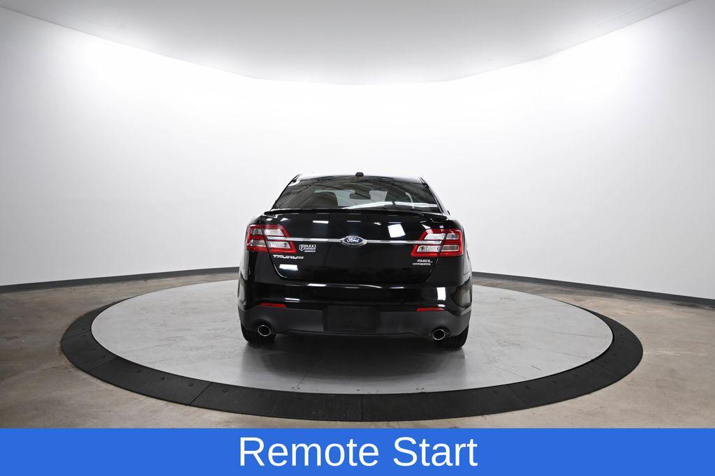 used 2018 Ford Taurus car, priced at $14,000
