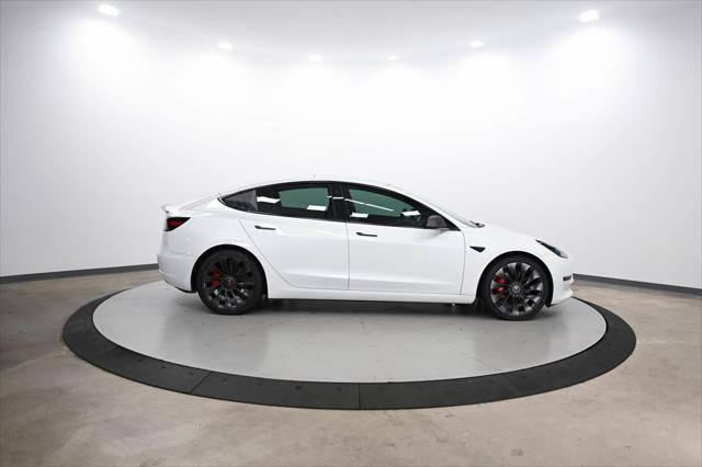 used 2023 Tesla Model 3 car, priced at $28,500