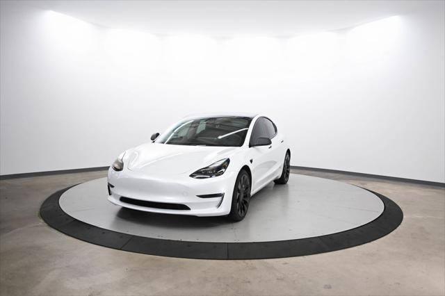 used 2023 Tesla Model 3 car, priced at $28,500