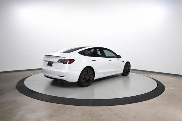 used 2023 Tesla Model 3 car, priced at $28,500