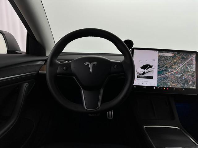 used 2023 Tesla Model 3 car, priced at $28,500