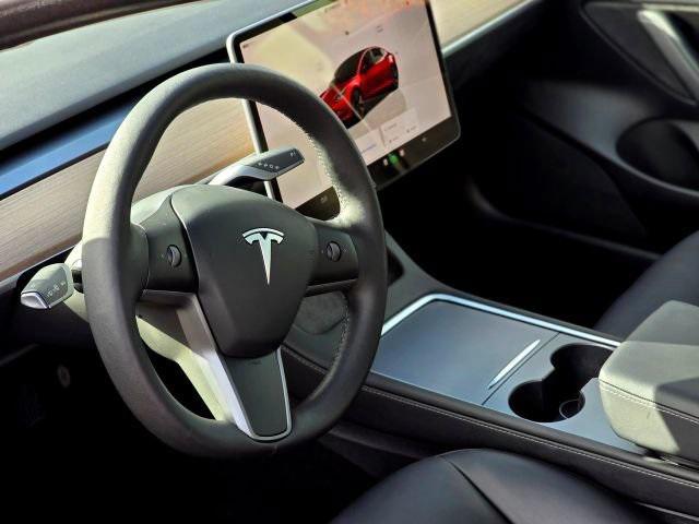 used 2023 Tesla Model 3 car, priced at $18,995