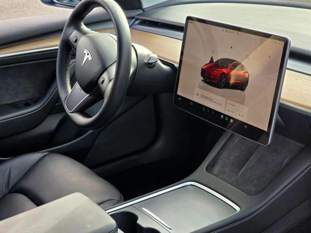 used 2023 Tesla Model 3 car, priced at $18,995