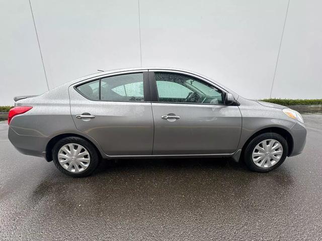 used 2014 Nissan Versa car, priced at $10,995