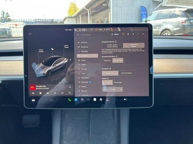 used 2023 Tesla Model 3 car, priced at $20,995