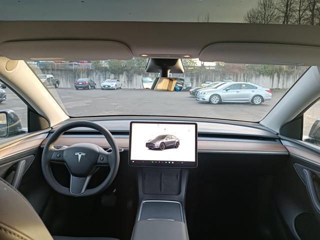 used 2023 Tesla Model Y car, priced at $34,995