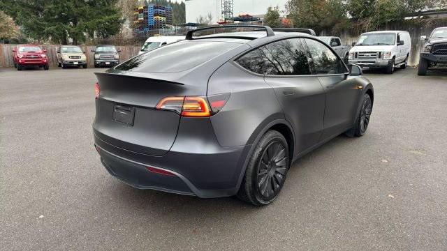 used 2024 Tesla Model Y car, priced at $41,995