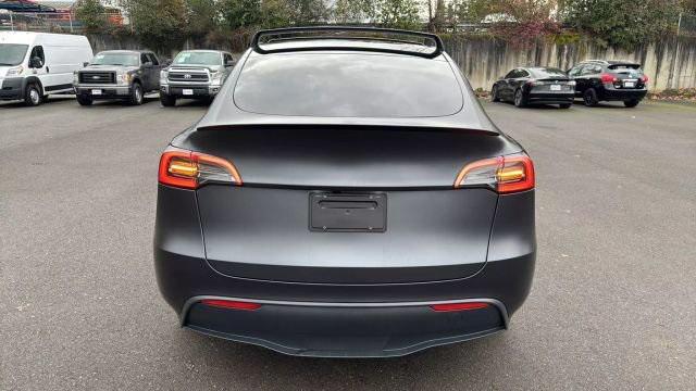 used 2024 Tesla Model Y car, priced at $41,995