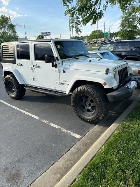 used 2015 Jeep Wrangler Unlimited car, priced at $23,783