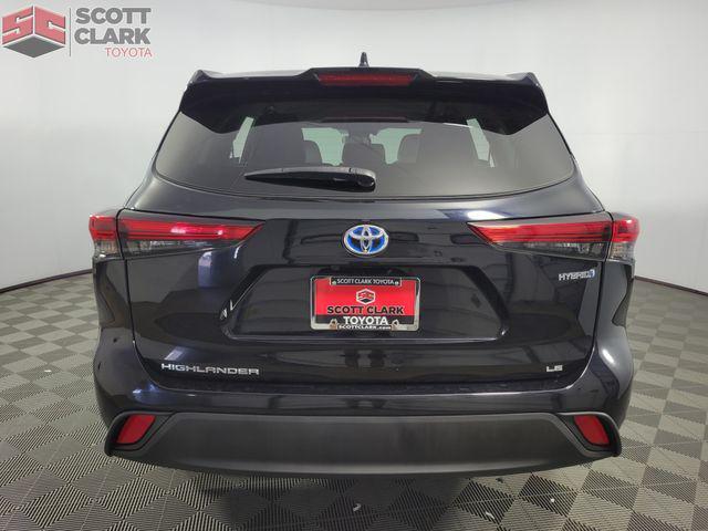 used 2021 Toyota Highlander Hybrid car, priced at $28,486