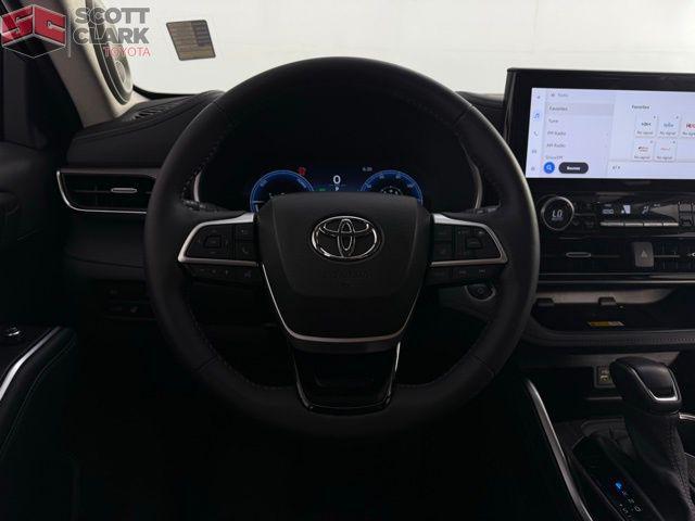 used 2024 Toyota Highlander Hybrid car, priced at $50,878