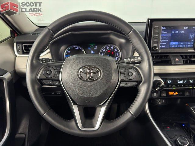 used 2021 Toyota RAV4 Hybrid car, priced at $29,113