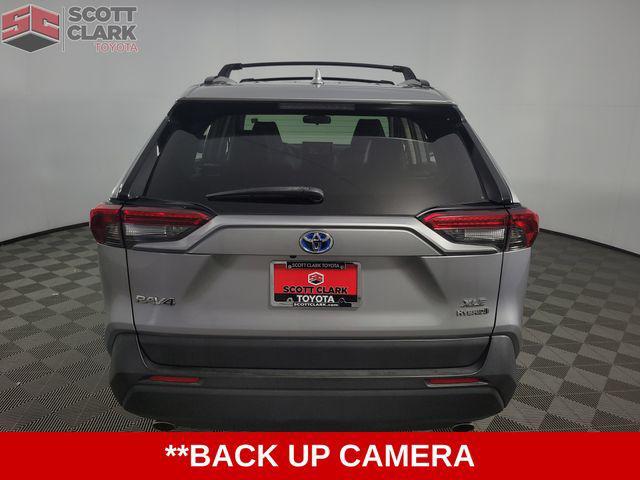 used 2021 Toyota RAV4 Hybrid car, priced at $31,672