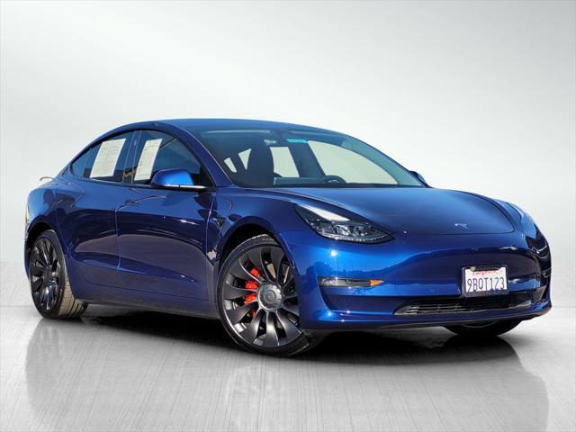 used 2022 Tesla Model 3 car, priced at $30,900