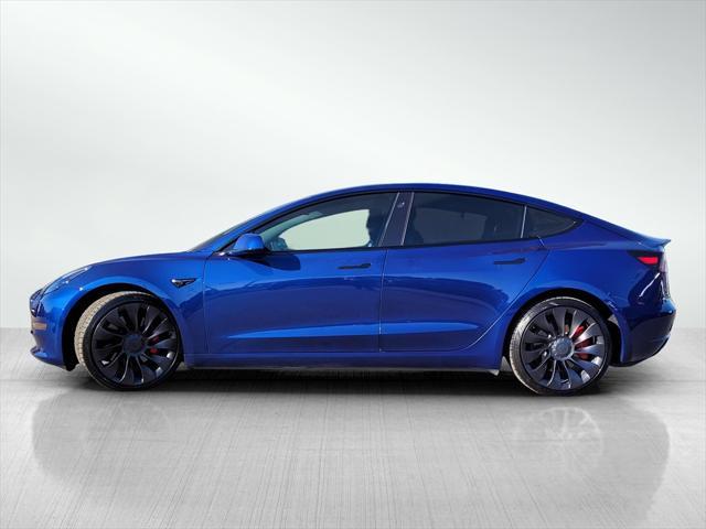 used 2022 Tesla Model 3 car, priced at $30,900