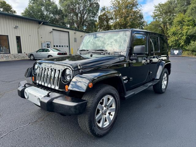 used 2013 Jeep Wrangler Unlimited car, priced at $19,900