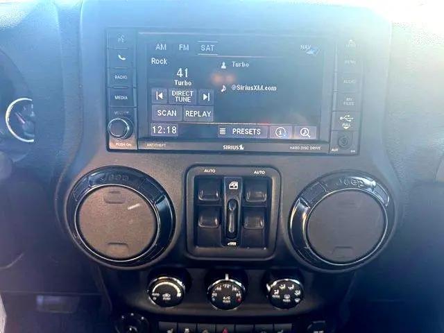 used 2018 Jeep Wrangler JK Unlimited car, priced at $29,900