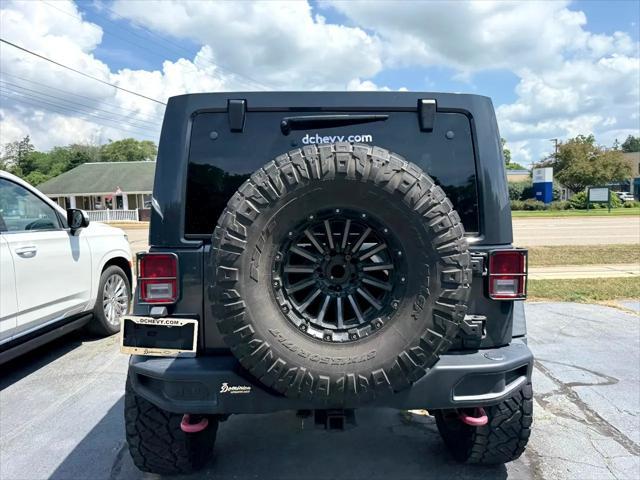 used 2018 Jeep Wrangler JK Unlimited car, priced at $29,900