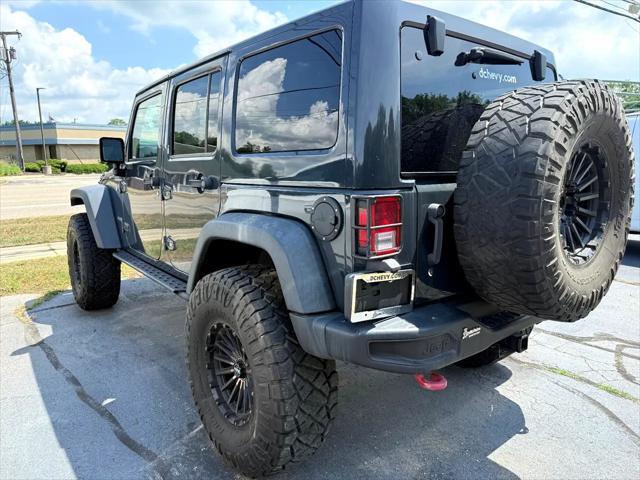 used 2018 Jeep Wrangler JK Unlimited car, priced at $29,900