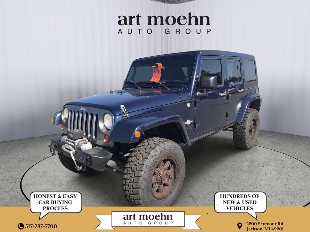 used 2013 Jeep Wrangler Unlimited car, priced at $13,449