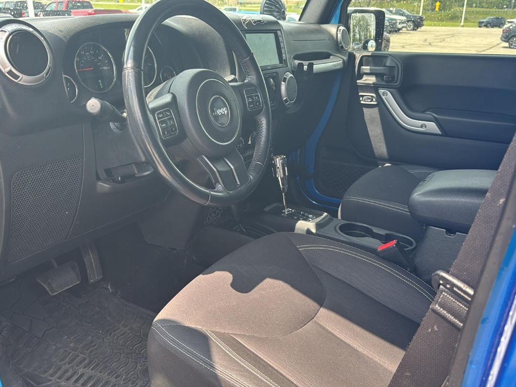 used 2015 Jeep Wrangler Unlimited car, priced at $19,355