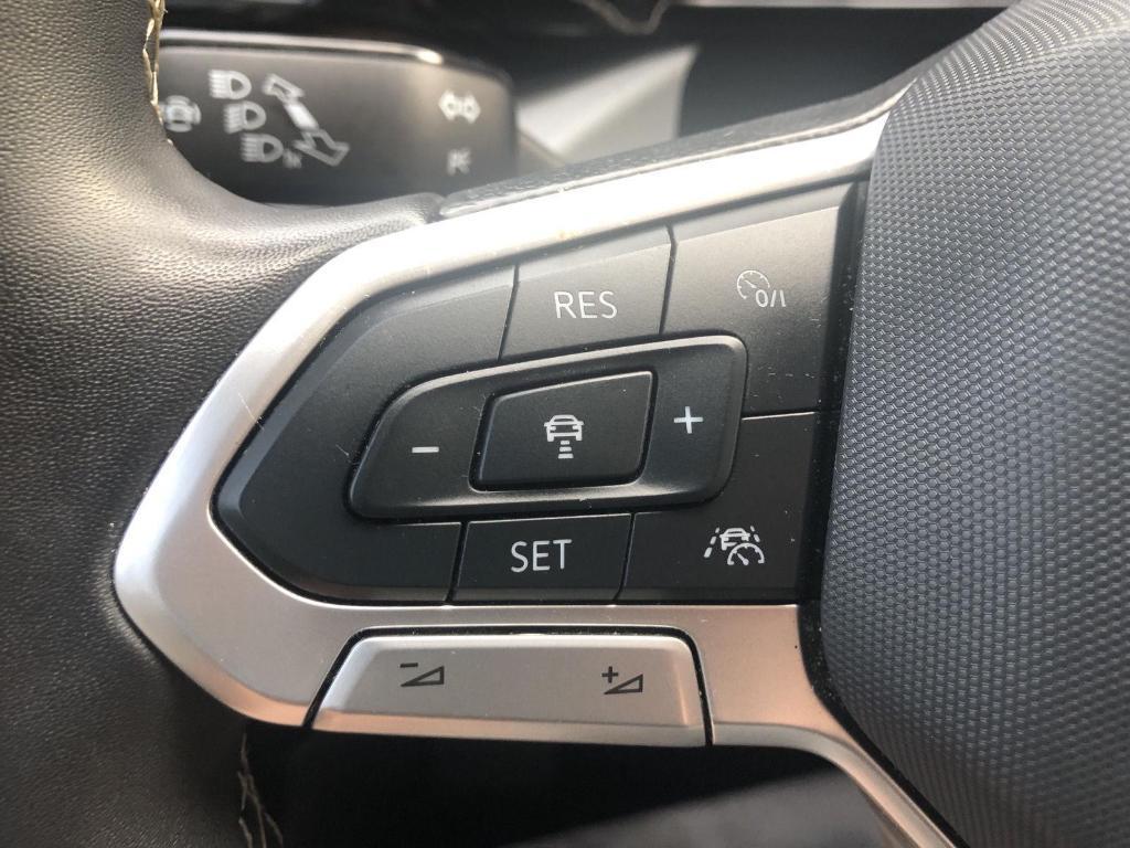 used 2024 Volkswagen Taos car, priced at $21,875