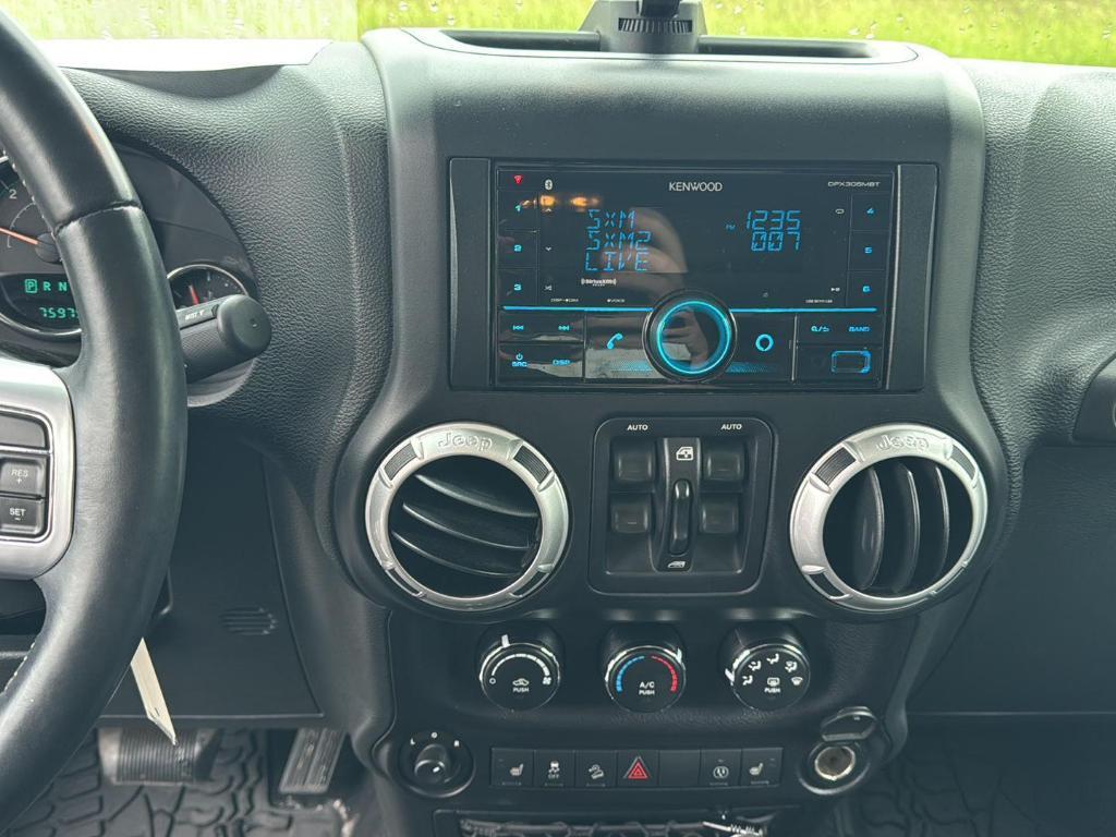 used 2015 Jeep Wrangler Unlimited car, priced at $18,529