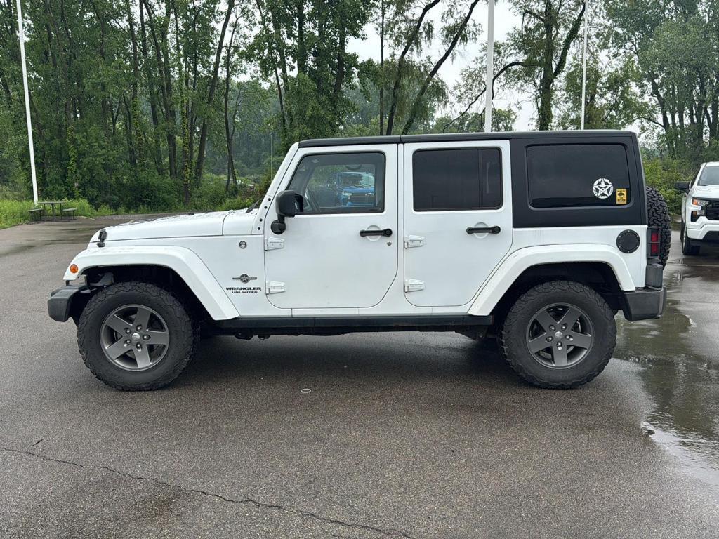 used 2015 Jeep Wrangler Unlimited car, priced at $18,529