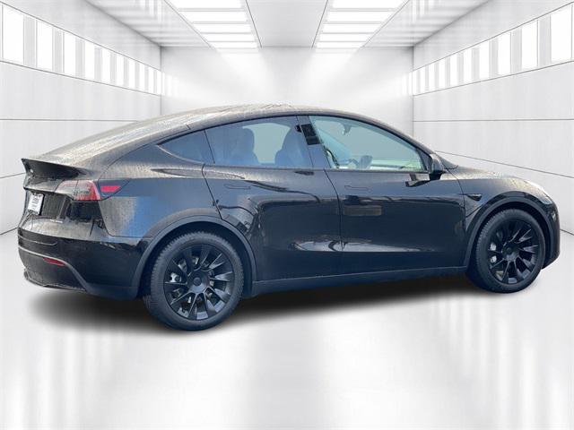 used 2023 Tesla Model Y car, priced at $32,499