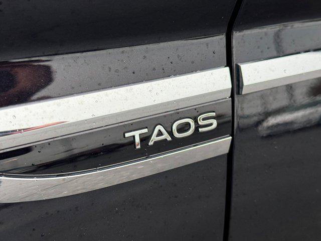 used 2023 Volkswagen Taos car, priced at $18,999