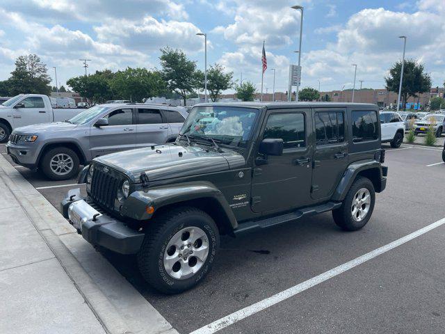 used 2015 Jeep Wrangler Unlimited car, priced at $17,485