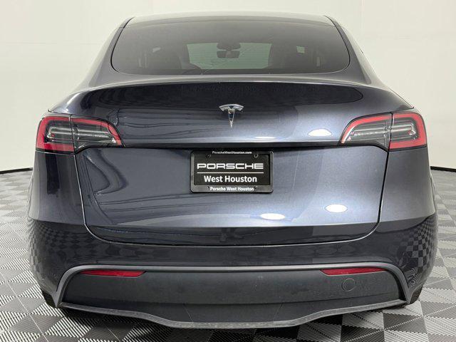 used 2024 Tesla Model Y car, priced at $32,399