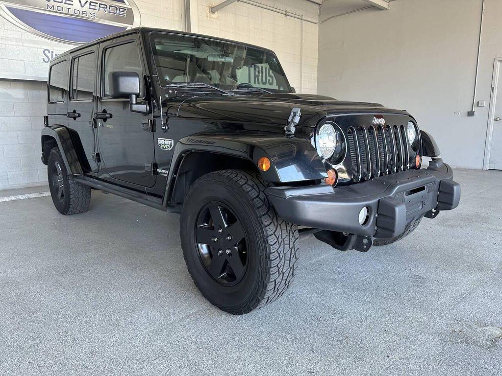 used 2012 Jeep Wrangler Unlimited car, priced at $19,998
