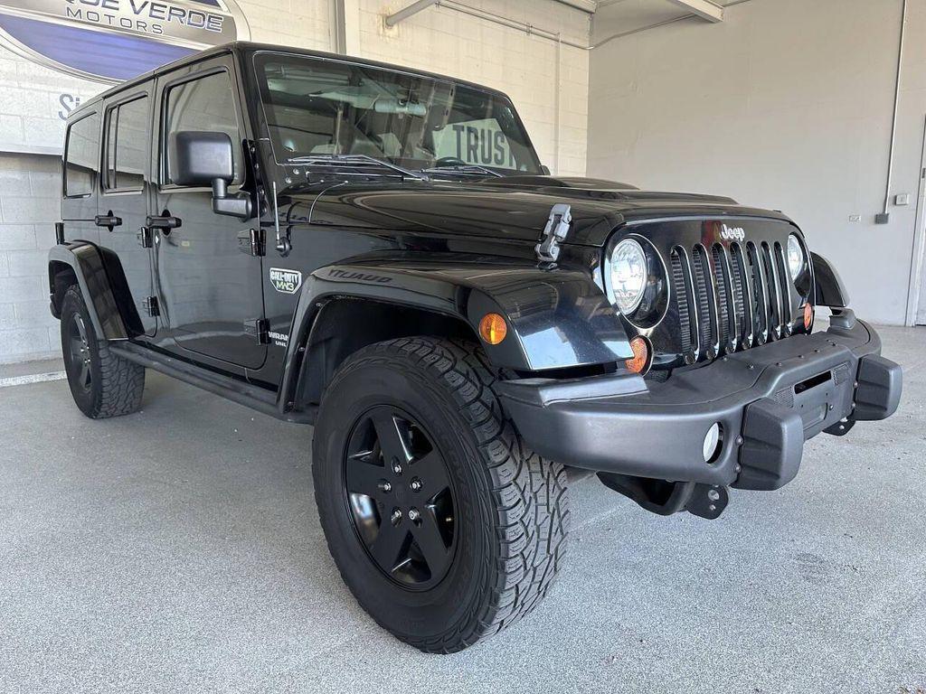 used 2012 Jeep Wrangler Unlimited car, priced at $19,998