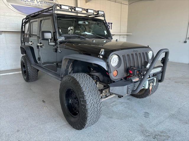 used 2010 Jeep Wrangler Unlimited car, priced at $21,998