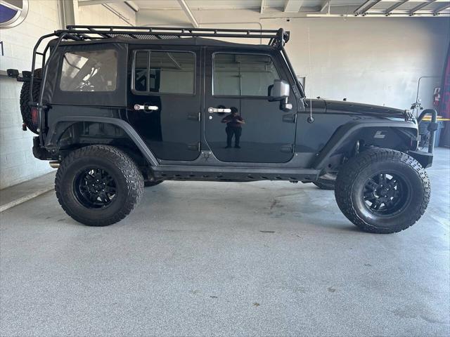 used 2010 Jeep Wrangler Unlimited car, priced at $21,998