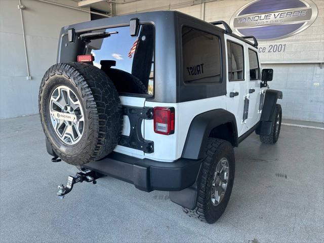 used 2015 Jeep Wrangler Unlimited car, priced at $23,998