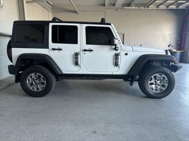 used 2015 Jeep Wrangler Unlimited car, priced at $23,998