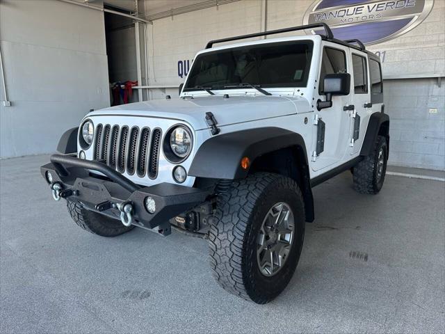 used 2015 Jeep Wrangler Unlimited car, priced at $23,998