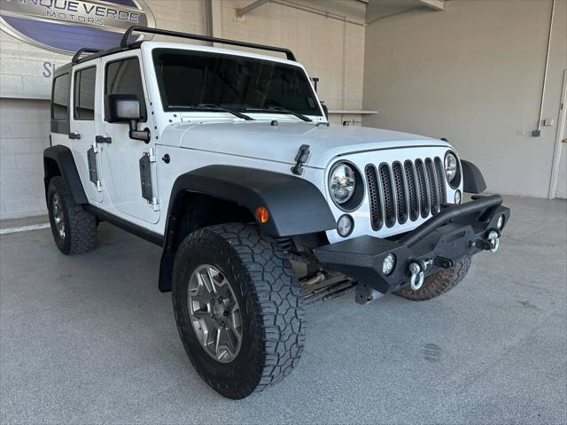 used 2015 Jeep Wrangler Unlimited car, priced at $23,998