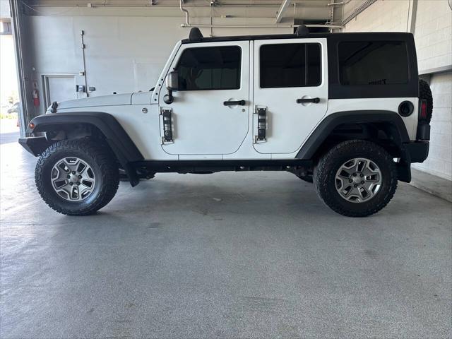 used 2015 Jeep Wrangler Unlimited car, priced at $23,998