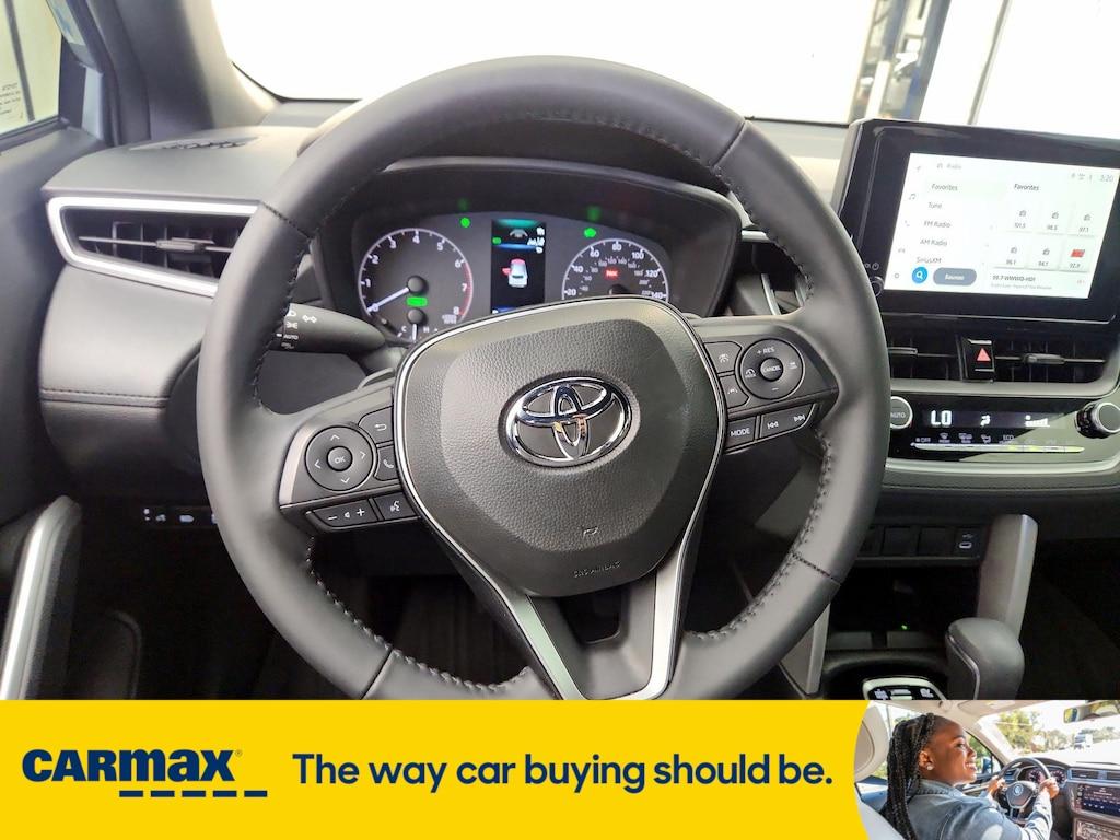 used 2024 Toyota Corolla Cross Hybrid car, priced at $33,998