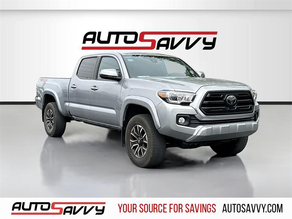 used 2021 Toyota Tacoma car, priced at $30,000