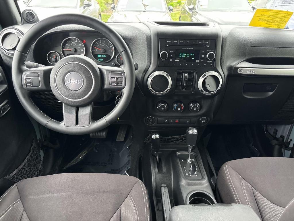 used 2014 Jeep Wrangler Unlimited car, priced at $24,500